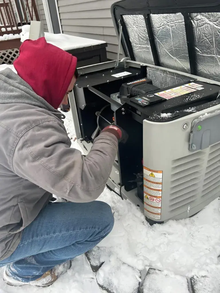 ESCON technician Jacob completing a generator hookup